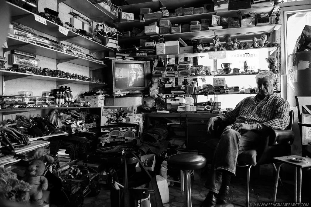 antique toy store owner portrait seagram pearce